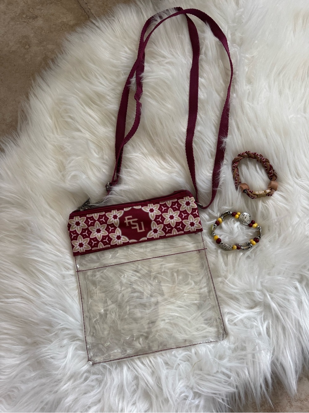 FSU Garnet Clear Crossbody Bag with Floral Trim and 2 FSU bracelets.